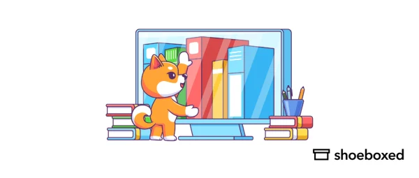 Mascot looking at books online
